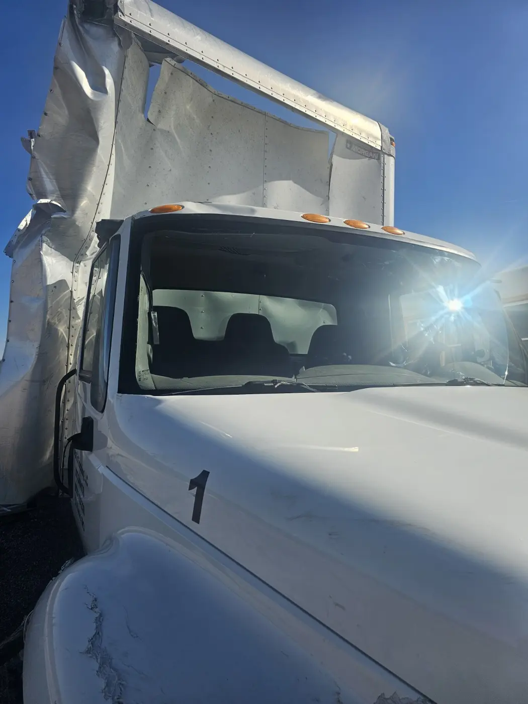 Box truck windshield serviced by Auto Glass Xpress mobile technicians